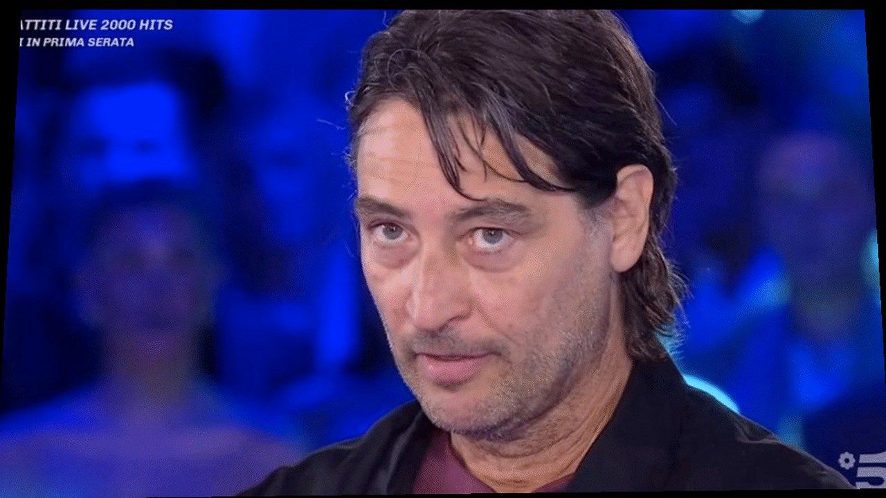 Simone Annicchiarico e il caso rientro al GF Vip: cover Bigodino, warp geometrico (volti invariati)