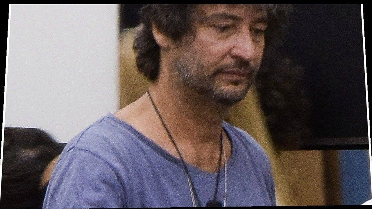 Simone Annicchiarico squalificato dal GF Vip — cover Bigodino, warp geometrico (volti invariati)