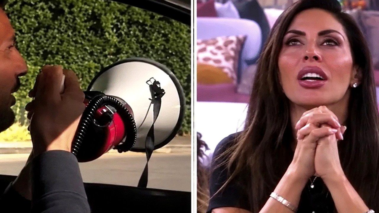 Federico Perna con il megafono fuori dalla Casa del GF Vip e Guendalina Tavassi in ascolto
