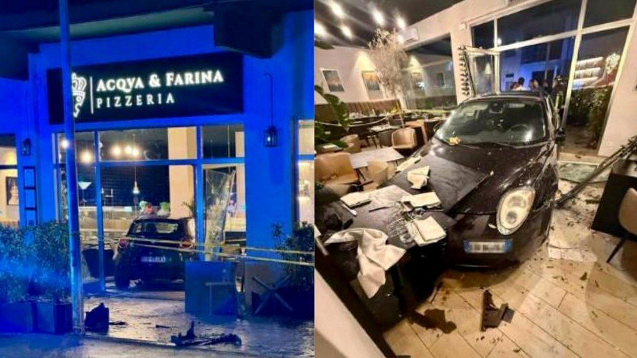 Pontedera, l’Alfa Romeo Mito finita nella pizzeria Acqva & Farina in via Salvo D’Acquisto: vetrate distrutte, nessun ferito